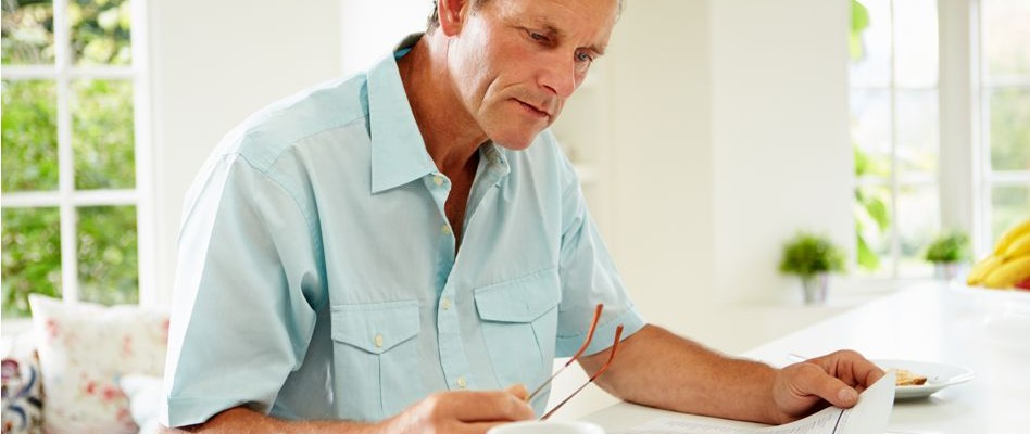 man reading editorial